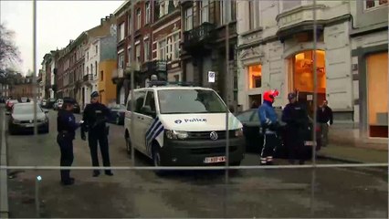 Belgian police find Paris fugitive's fingerprint, explosive traces, vests in flat