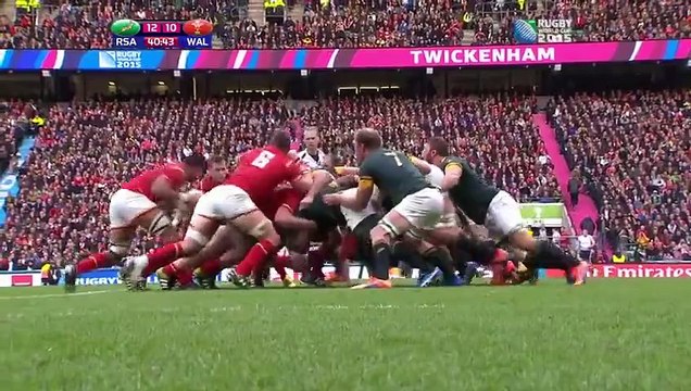 Dan Biggar hammers over a drop goal for Wales