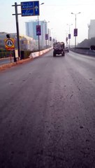 How trash truck throwing trash all over the road