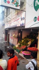 DHA police helps to control the fire with firefighters