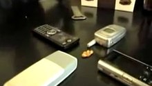 Pop Corn + telephone portable= micro ondes.
