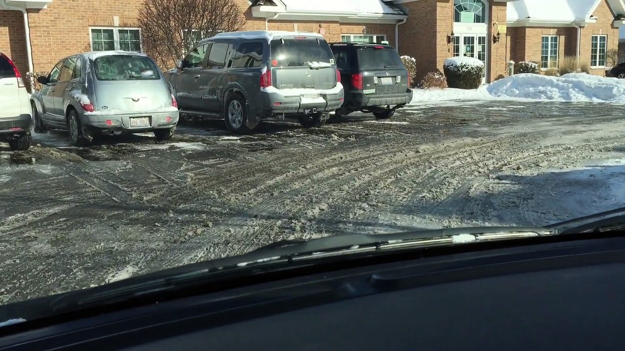 The Fiat 500 handles snow on roads in a suburban winter just fine