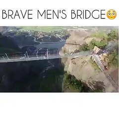 Brave men's bridge in China made by glass, hard to walk on