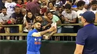 Virat kohli taking selfies with fans