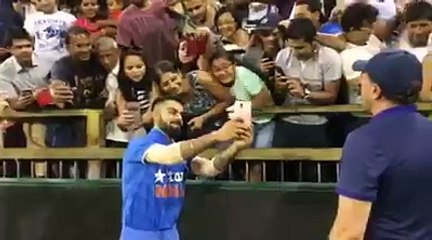 Virat kohli taking selfies with fans