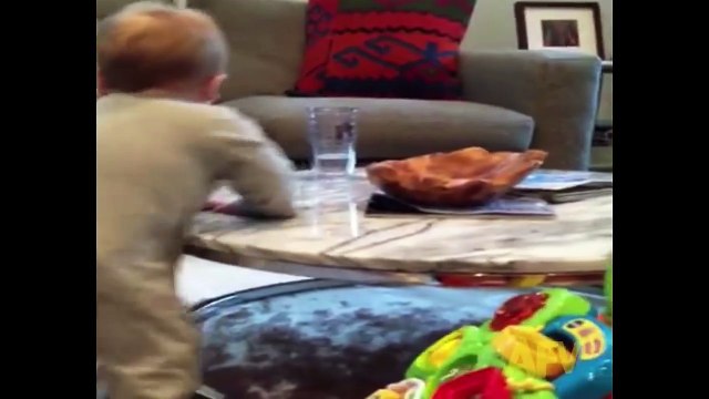 Baby Can't Resist Knocking Over the Water