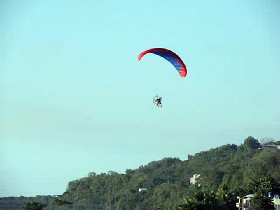 ellie pic 124.MPG man paragliding through Isabela and Aguadilla