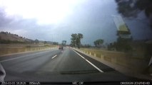 Dramatic lightning strikes caught on dashcam in Canberra, Australia