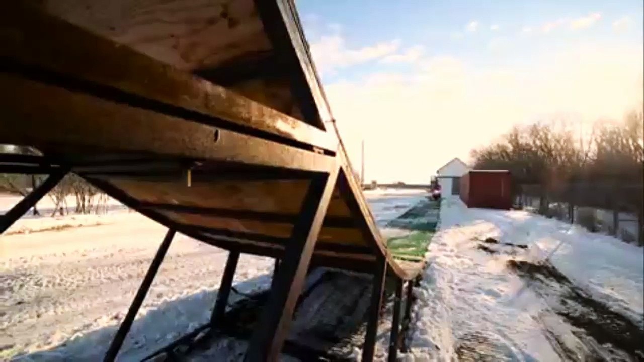 Athlete Performs Backflip in Snowmobile