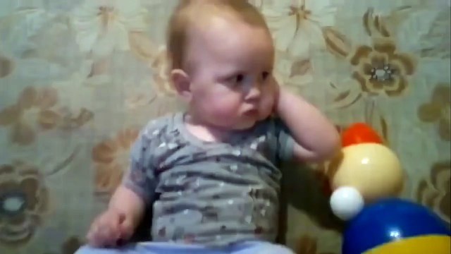 Важный разговор по телефону малыша