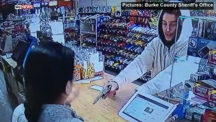 Woman Hits Robber With Till Tray And Foils Raid