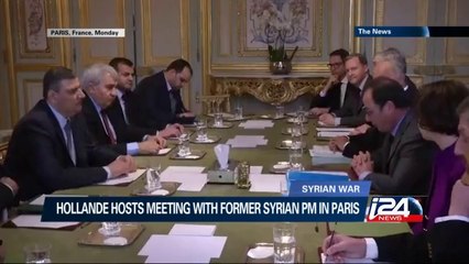 Hollande hosts meeting with former Syrian PM in Paris