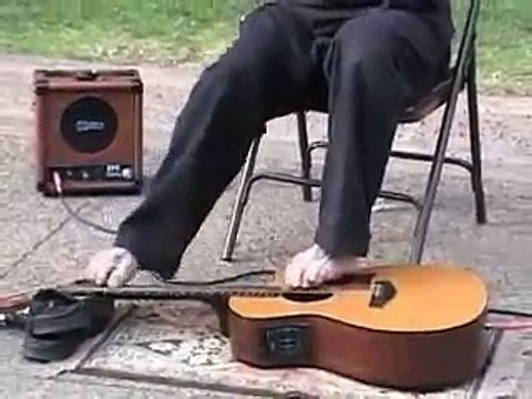 No Arms Guitar Player, plays guitar with his feet