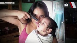 Photo of Woman Holding Gun at Baby’s Head Goes Viral