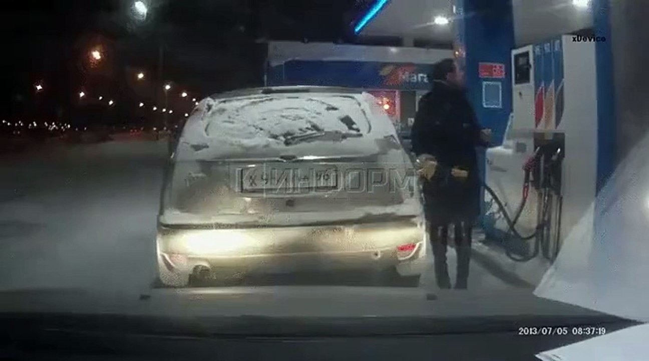 She Is Checking Petrol Tank With A Lighter