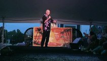 Chris Drummond auctioning off his Elvis Presley painting August 2010