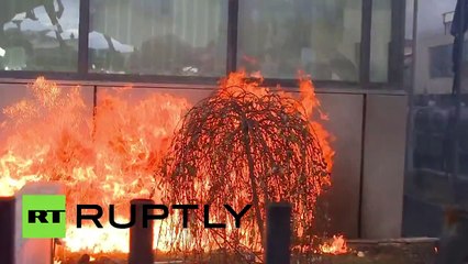 Molotovs & stones: Protesters set Kosovo govt HQ on fire over deal with Serbia