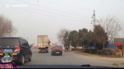 Half crushed lorry still going strong on the road
