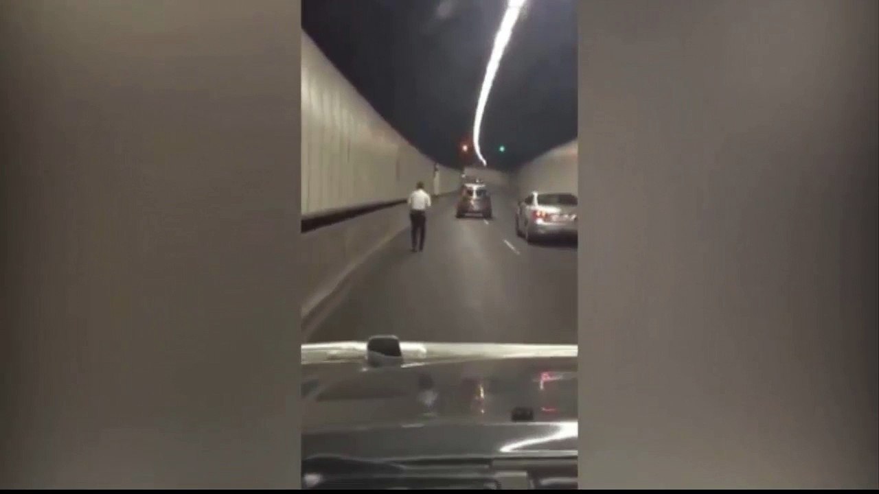 'Stupid and dangerous' man filmed riding children's scooter through busy tunnel