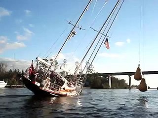 How to get an 80' rig through the 65' bridges of the Intracoastal Waterway using two tons of water.