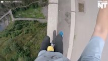 Daredevil Unicycles Across The Ledge Of One Of Europe's Tallest Dams