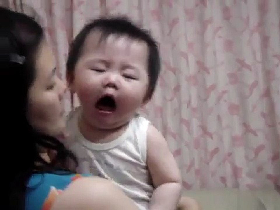 Baby french kissing with Mommy