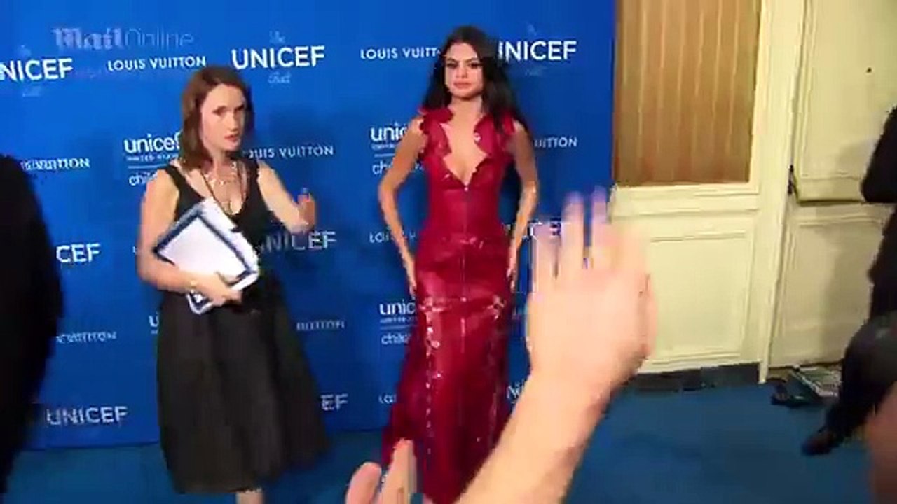 Selena Gomez Stuns In A Red Louis Vuitton Gown On The 6th Biennial UNICEF Ball Blue Carpet 2016
