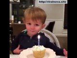 Lovely kid. Let us to help him turn off birthday candle.