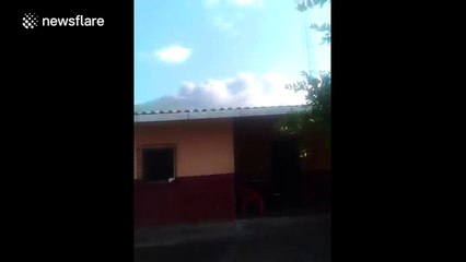 El Salvador's Chaparrastique volcano erupts ash and gas