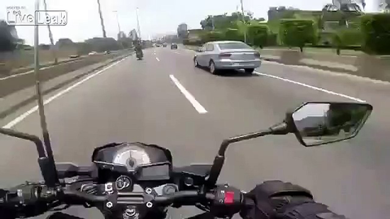 Biker lost control at gun point and kisses the asphalt