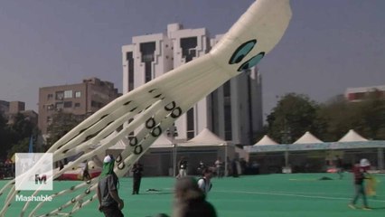 Giant creatures fill the skies for India's kite festival, and they're pretty creepy