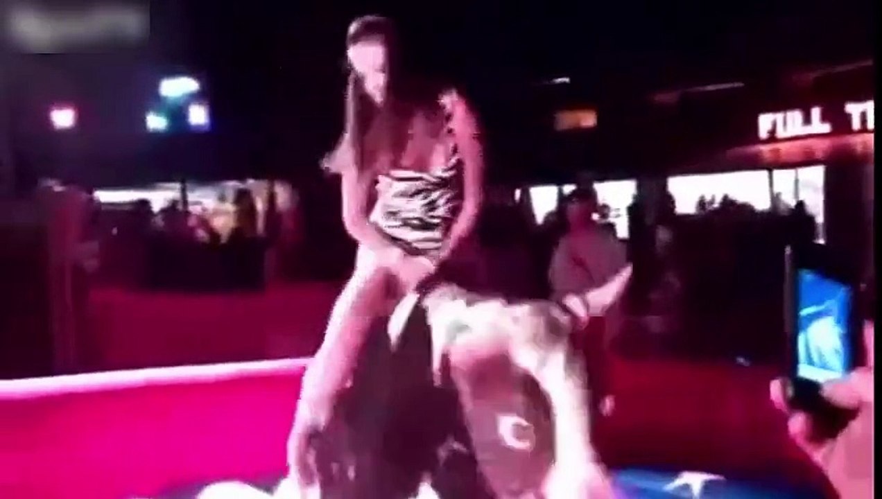 a girl miniSkirt riding Bull - Part 3