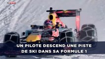 Un pilote descend une piste de ski dans sa Formule 1