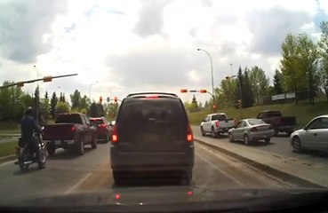 Motorcyclist Rear Ended at Stop Light