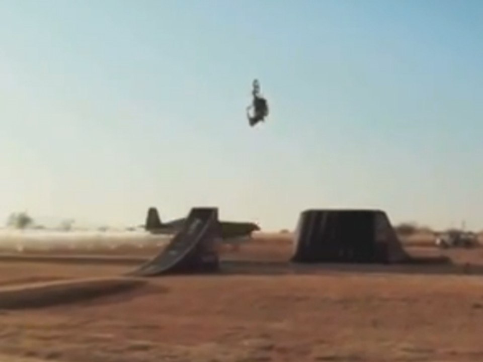 Dirtbike Backflips over Aerobatic Plane