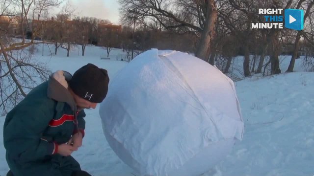 Rolling Down a Hill in a Snowball Piñata