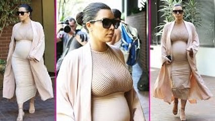 Kim Kardashian Puts Baby Bump on Display in See-Through Nude Dress