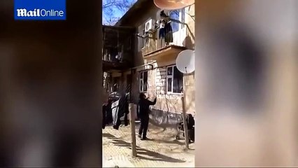 Lazy Mother Drops Toddler From Balcony Into Fathers Arms