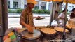 Thai Street Food in Bangkok. Cooking Kanom Krok Coconut Pancakes -