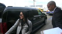 Olivia Munn Surrounded By Autograph Seekers At LAX