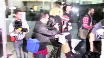 Khloe Kardashian Is All Smiles Causing Chaos At LAX After Armenia Trip