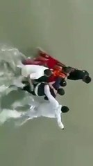 heavy flood during rain and rescued themselves.