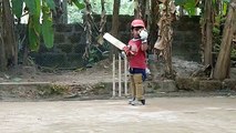 Three years old boy showing his classical batting skills