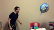 Cute Baby Laughing At Balloon His Father Playing With For Him