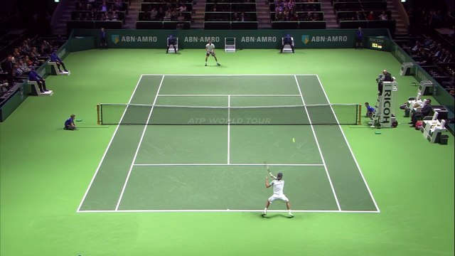 Ball boy juggles with Tennis Balls in his Back during Game