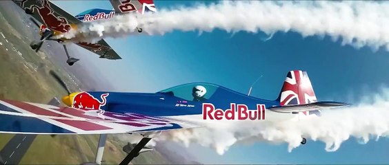 Two Planes Fly Through a Hangar – Red Bull Barnstorming