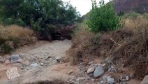 Flash Flood Washes Across Utah Desert Road