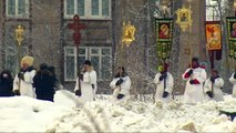 Russian Orthodox believers take icy plunge to mark Epiphany