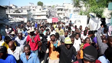Haitians protest presidential run-off as candidate pulls out