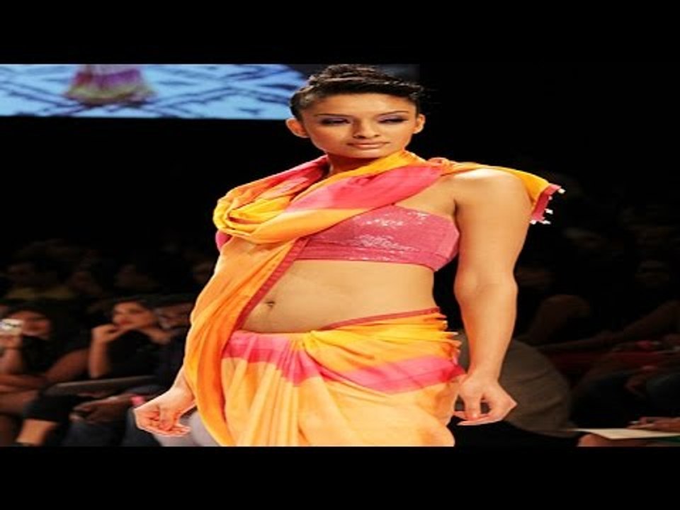 Hot Model Strikes Poses On Ramp At LFW Summer Resort 2015